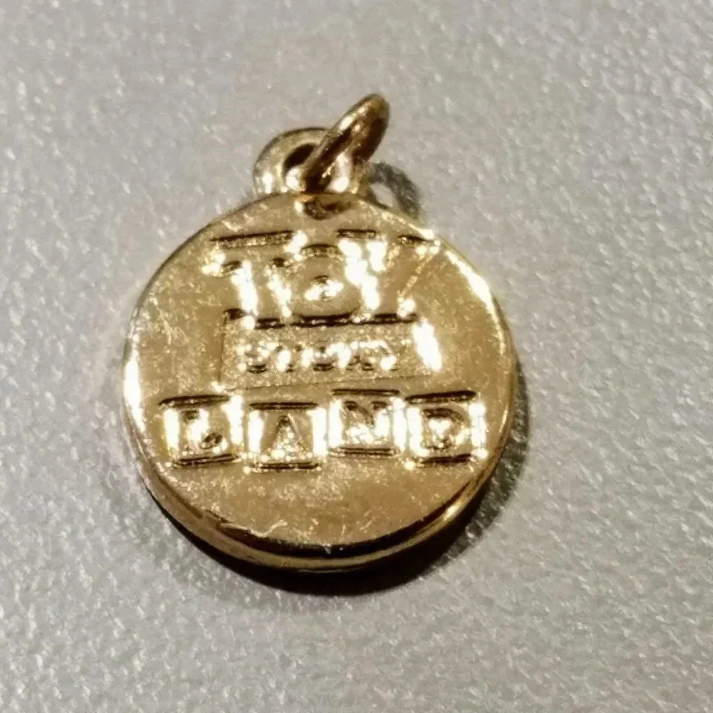 Toy Story Land Pendant Charm Gold Tone Poof Sticky